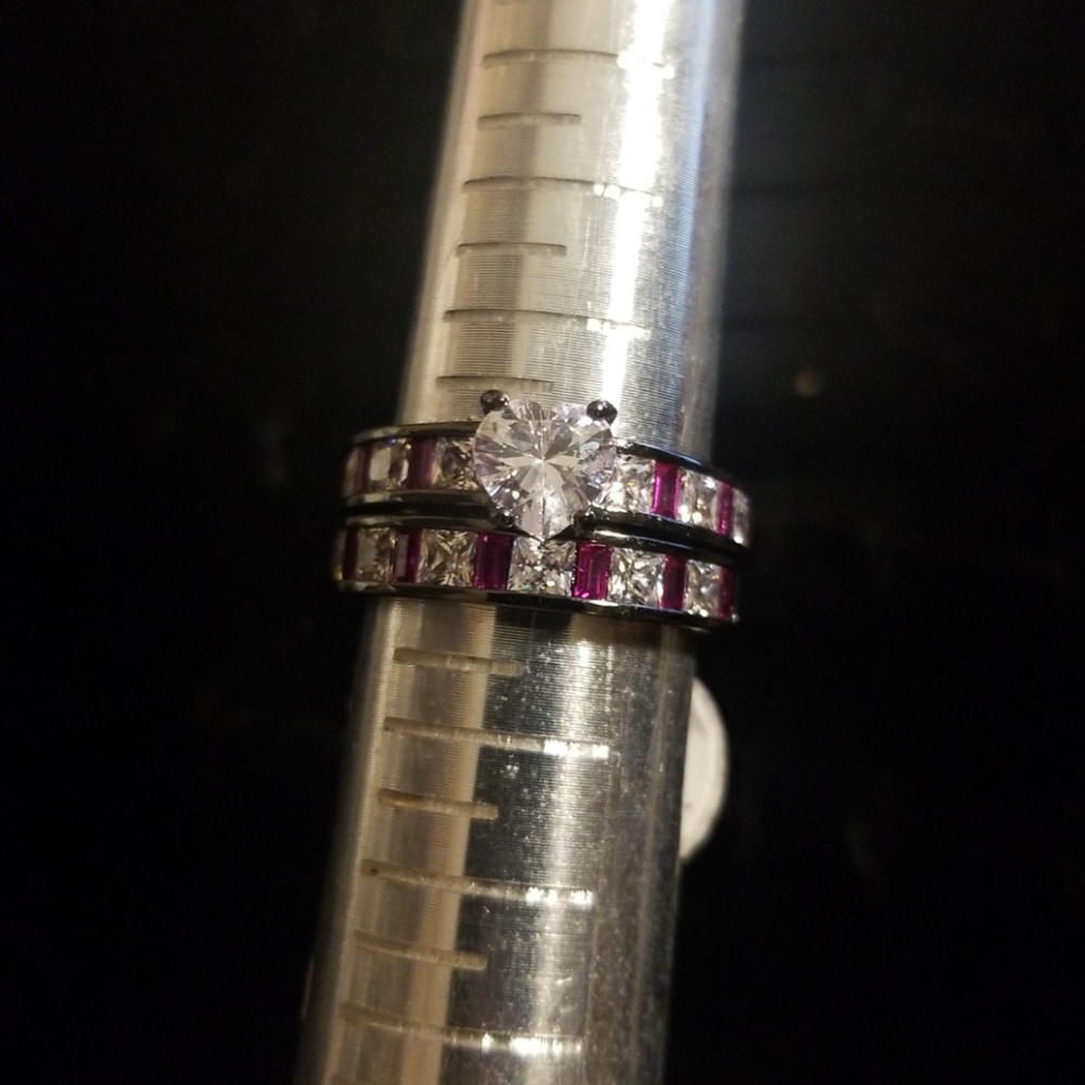Black and pink heart ring.
